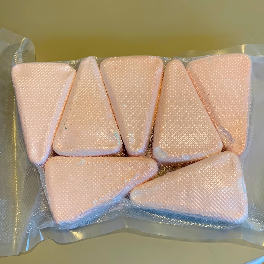 7 pink triangles
